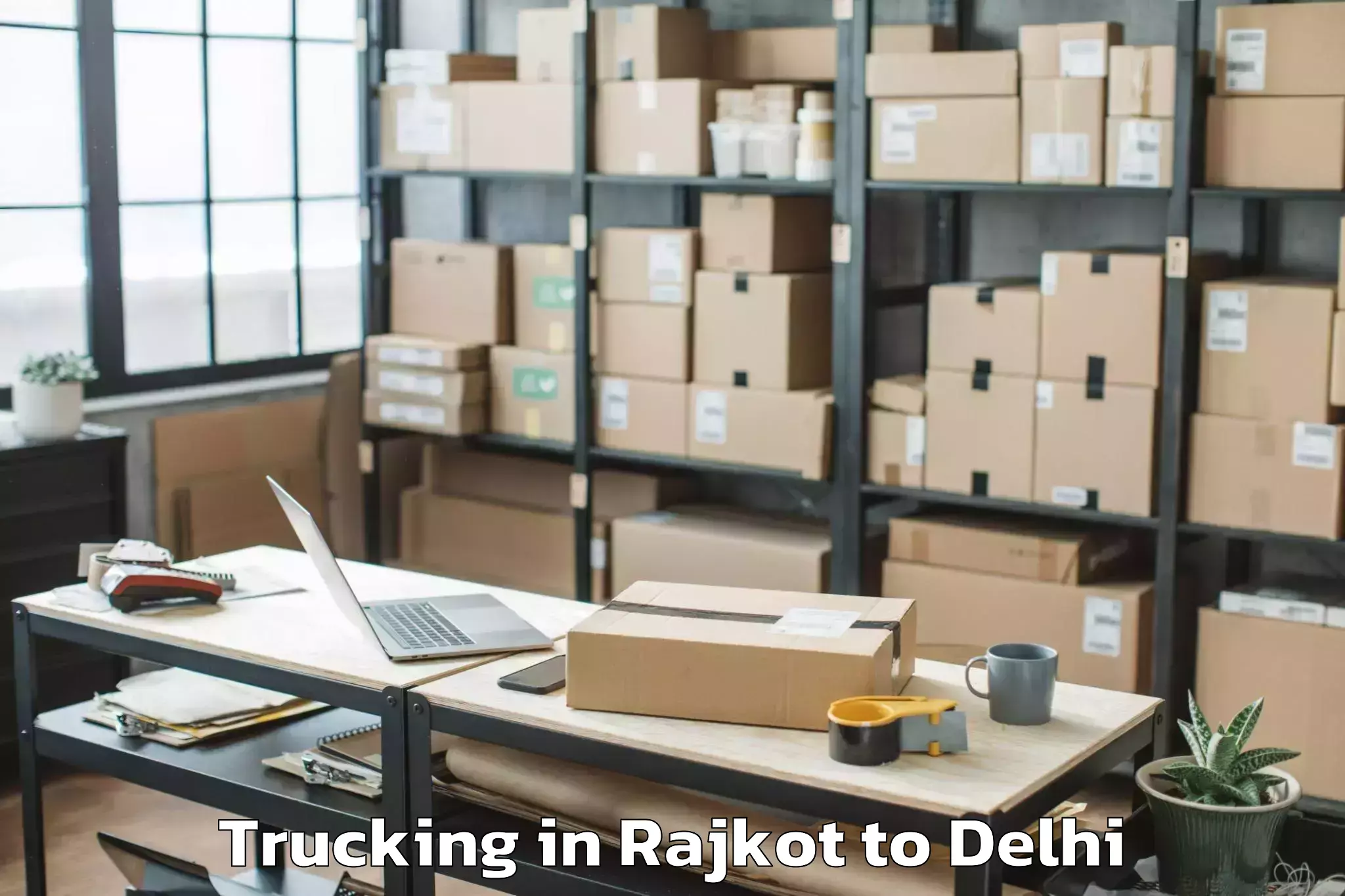 Top Rajkot to Lodhi Road Trucking Available